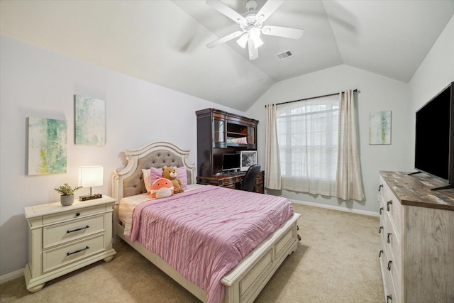 carpeted bedroom with vaulted ceiling and ceiling fan