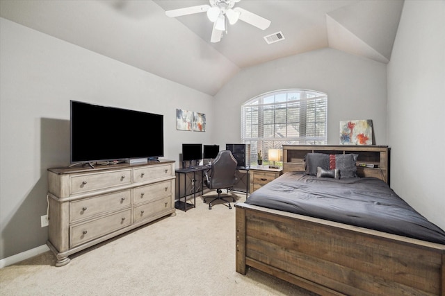 bedroom with lofted ceiling, light colored carpet, and ceiling fan