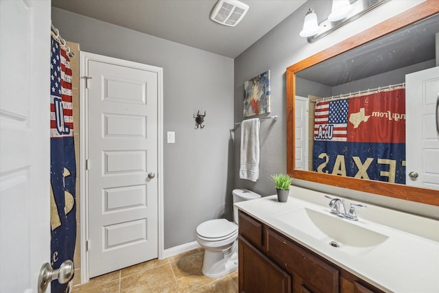 bathroom featuring vanity, a shower with curtain, and toilet