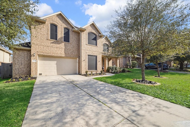 view of front of house with a front lawn and a garage