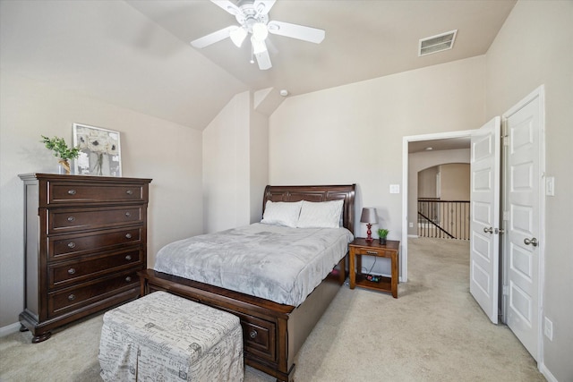 carpeted bedroom with lofted ceiling and ceiling fan