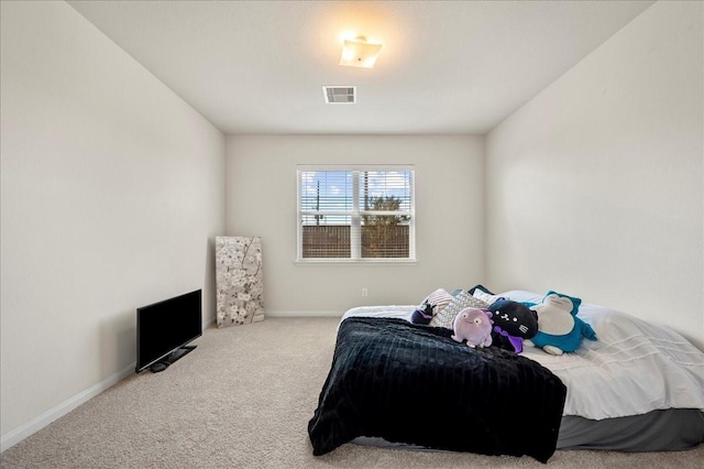 bedroom featuring carpet