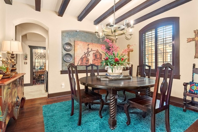 dining room with beam ceiling, dark wood-type flooring, and a chandelier