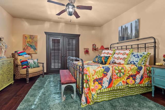 bedroom with french doors, ceiling fan, dark hardwood / wood-style flooring, and access to exterior