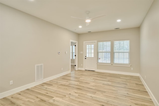 interior space featuring ceiling fan and light hardwood / wood-style flooring