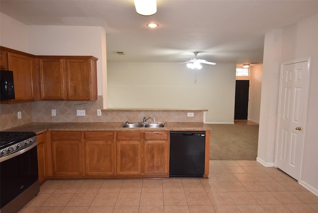 kitchen with sink, light tile patterned floors, ceiling fan, decorative backsplash, and black appliances