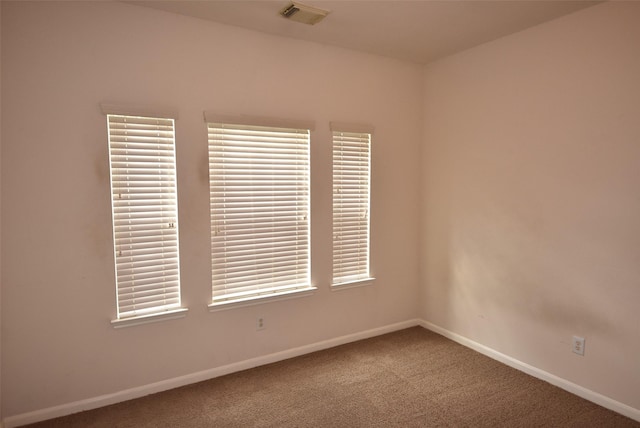 view of carpeted spare room