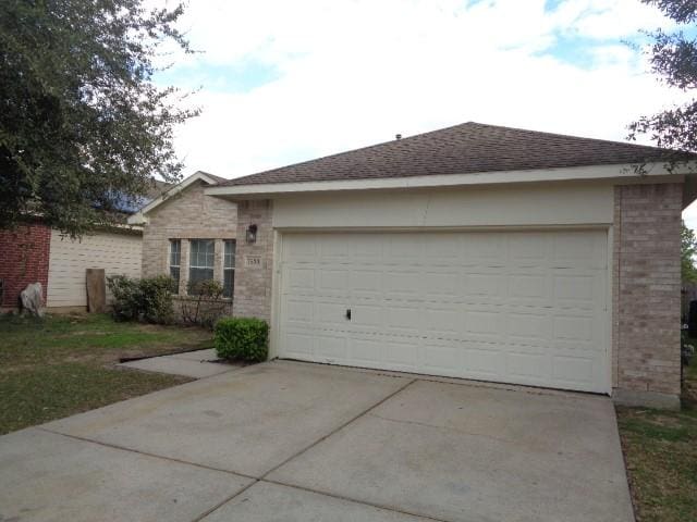 ranch-style house with a garage