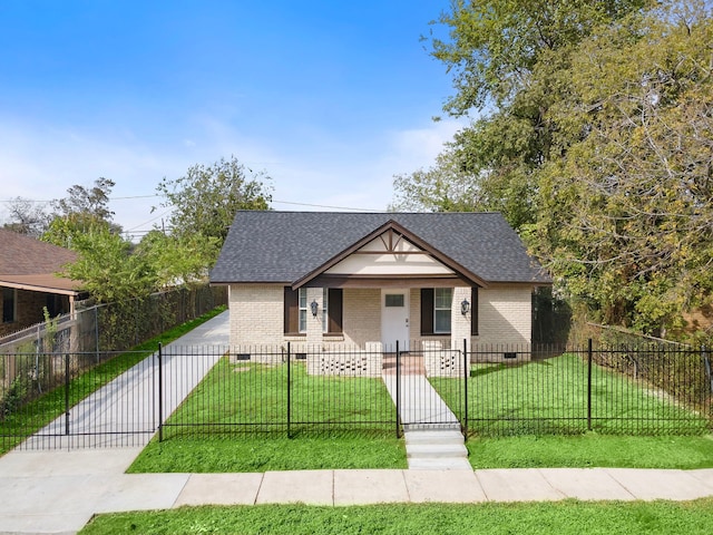 bungalow-style house with a front yard