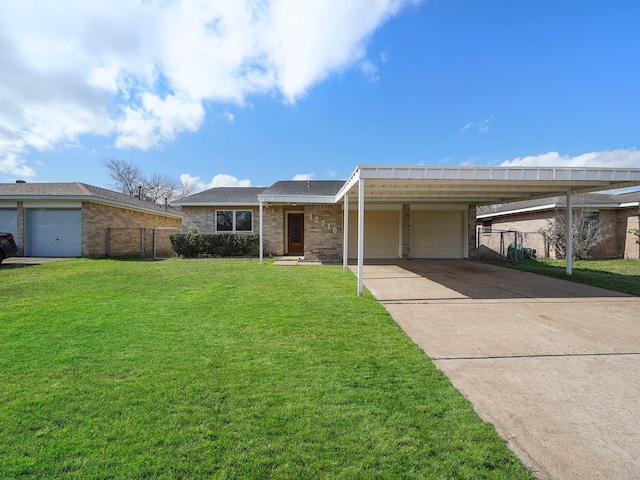 ranch-style home featuring a garage, a carport, and a front yard