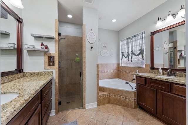 bathroom with tile patterned floors, plus walk in shower, and vanity