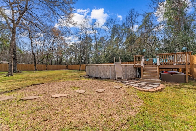 view of yard featuring a pool side deck