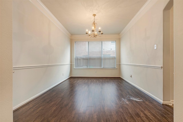 unfurnished dining area with ornamental molding, dark hardwood / wood-style floors, and a notable chandelier