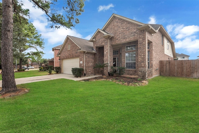 view of front of property with an attached garage, fence, a front lawn, and brick siding