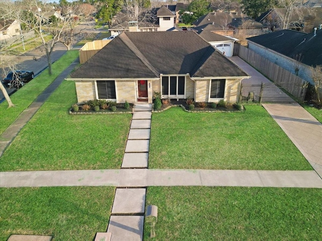 view of front facade with a front lawn