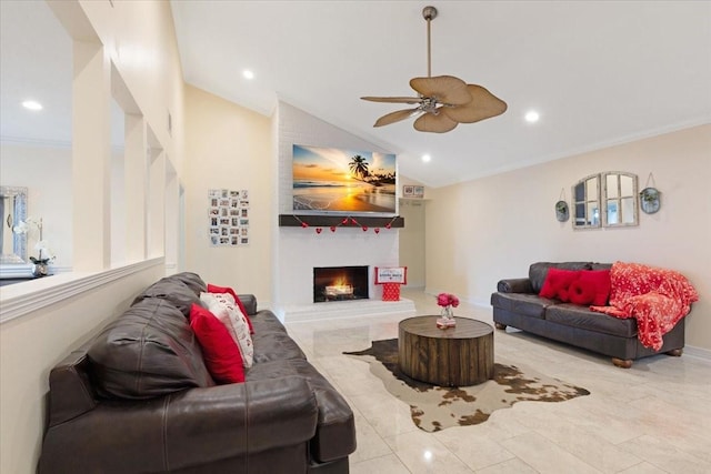 living room featuring crown molding, vaulted ceiling, and a large fireplace