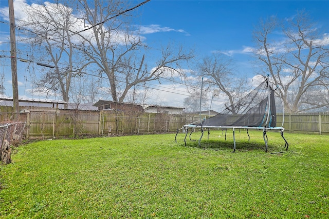 view of yard featuring a trampoline