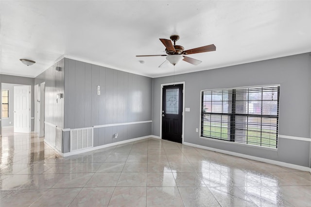 foyer with ceiling fan