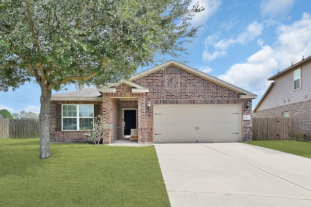 ranch-style house featuring a garage and a front lawn