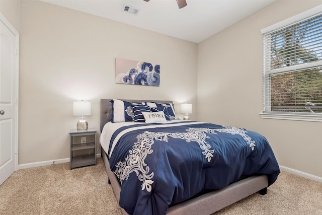 bedroom with ceiling fan and carpet flooring