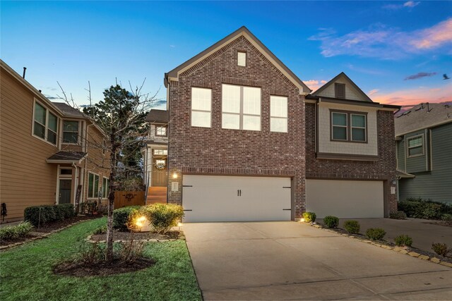 front of property with a garage