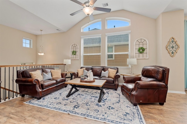 living room with vaulted ceiling and ceiling fan