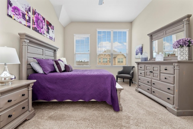 bedroom featuring vaulted ceiling, carpet, and ceiling fan