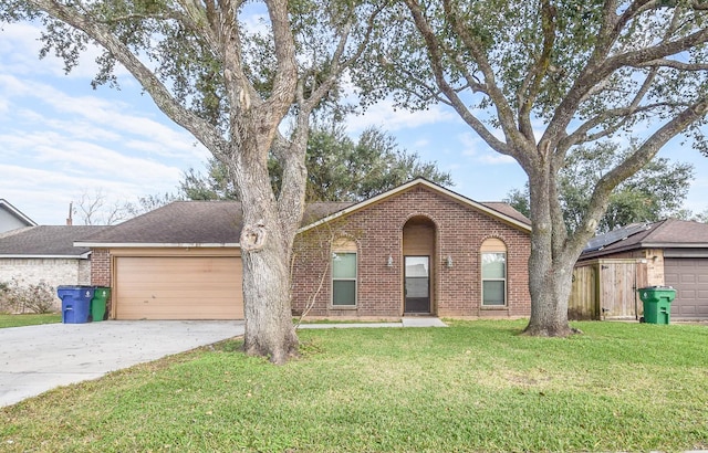 single story home with a garage and a front yard