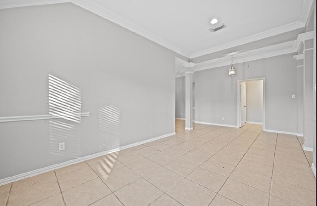 tiled spare room with crown molding and decorative columns