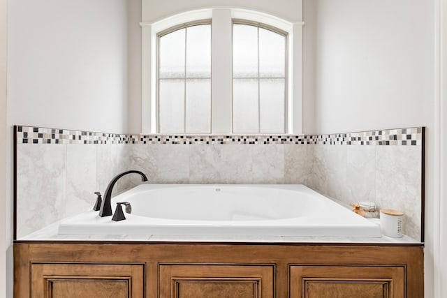 bathroom with a bathing tub