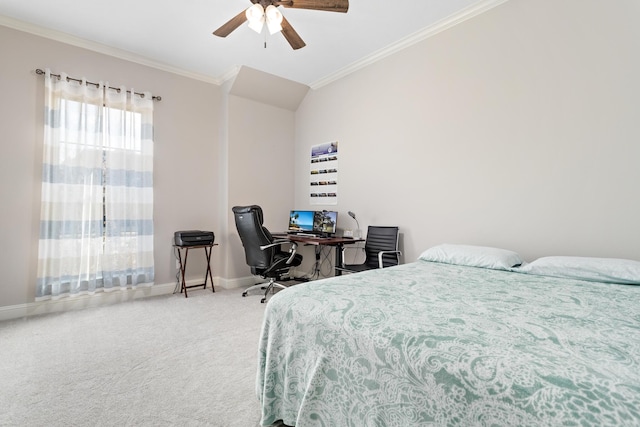 carpeted bedroom with lofted ceiling, crown molding, and ceiling fan