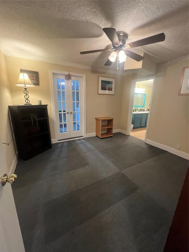 living room with french doors, ornamental molding, carpet, and a textured ceiling