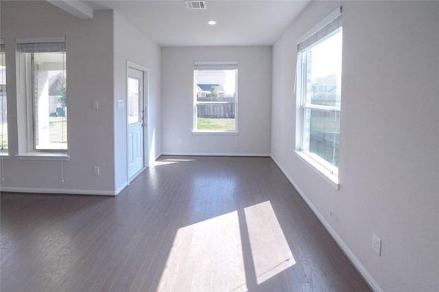 interior space with visible vents, baseboards, dark wood-style flooring, and recessed lighting