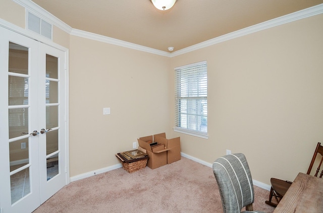 carpeted office with ornamental molding and french doors