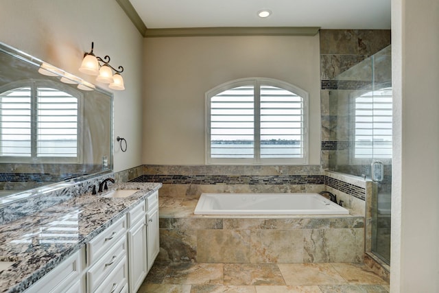 bathroom with crown molding, shower with separate bathtub, and vanity