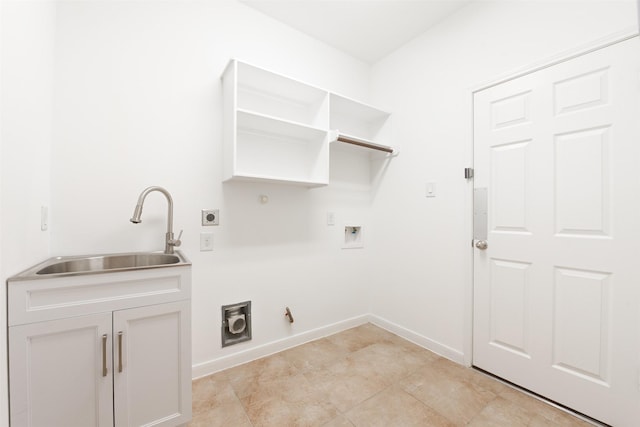 clothes washing area featuring sink, hookup for a gas dryer, cabinets, washer hookup, and electric dryer hookup