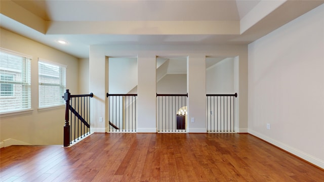 spare room featuring hardwood / wood-style floors