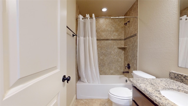 full bathroom featuring shower / bathtub combination with curtain, vanity, tile patterned floors, and toilet