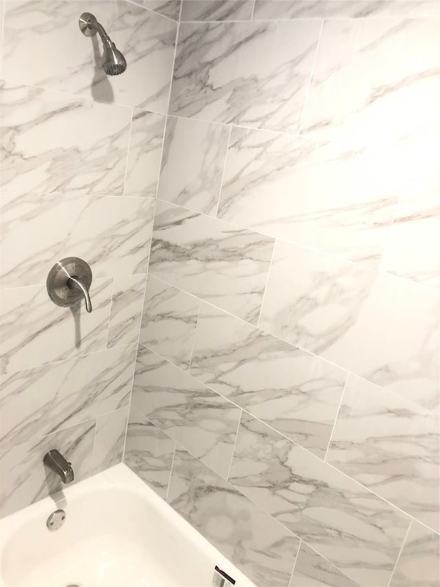 full bath with shower / bath combination