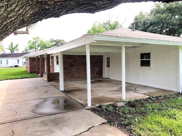 view of patio featuring a carport