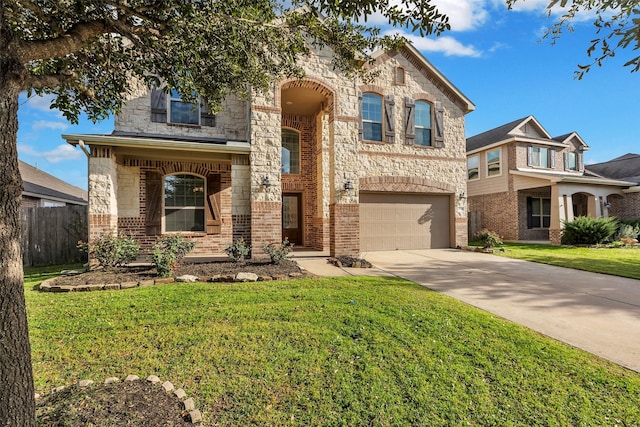 view of front of house featuring a garage and a front yard