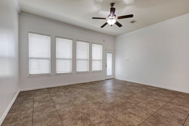 unfurnished room featuring ceiling fan and ornamental molding