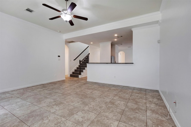 unfurnished room featuring crown molding, light tile patterned floors, and ceiling fan