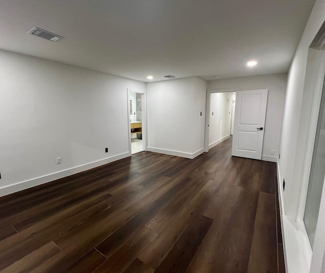 interior space with dark hardwood / wood-style flooring