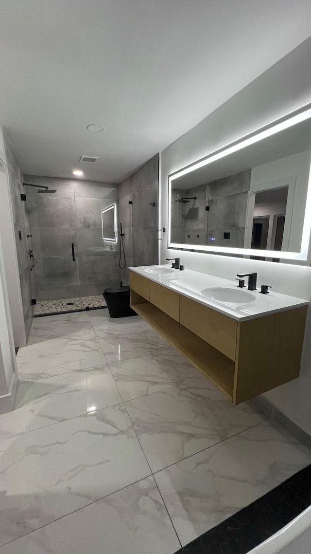 bathroom featuring vanity and walk in shower