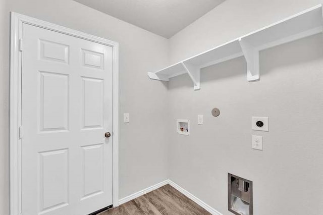 laundry area featuring washer hookup, hookup for a gas dryer, hardwood / wood-style flooring, and hookup for an electric dryer