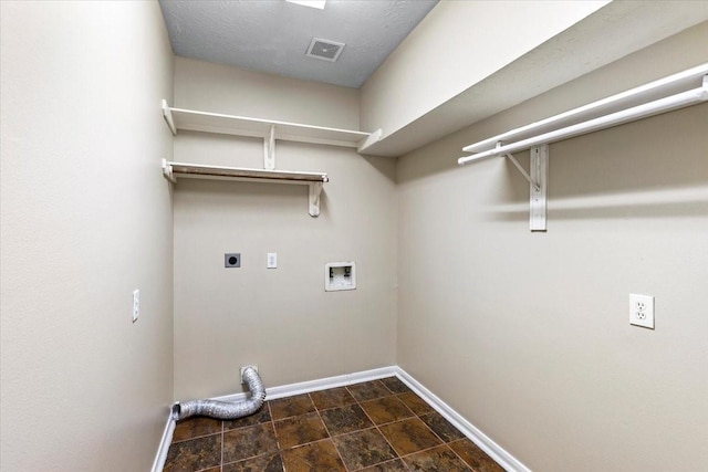 washroom featuring laundry area, hookup for a washing machine, baseboards, and electric dryer hookup