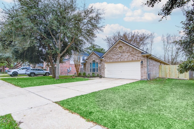 ranch-style house featuring driveway, brick siding, a front lawn, and fence