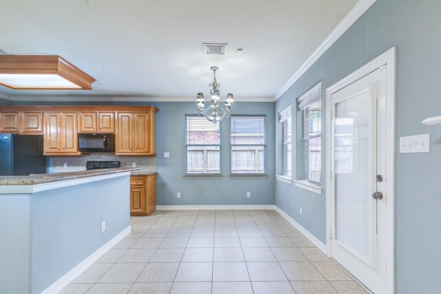 kitchen featuring crown molding, light tile patterned floors, tasteful backsplash, a chandelier, and black appliances