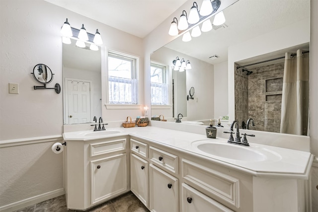 bathroom featuring vanity, tile patterned floors, and a shower with shower curtain